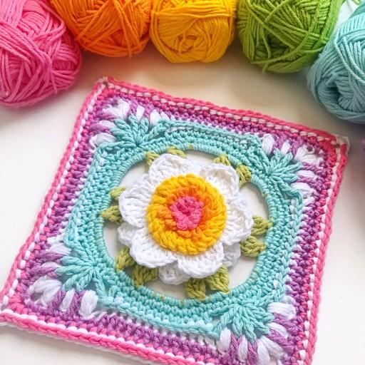 A bright coloured floral crochet granny square