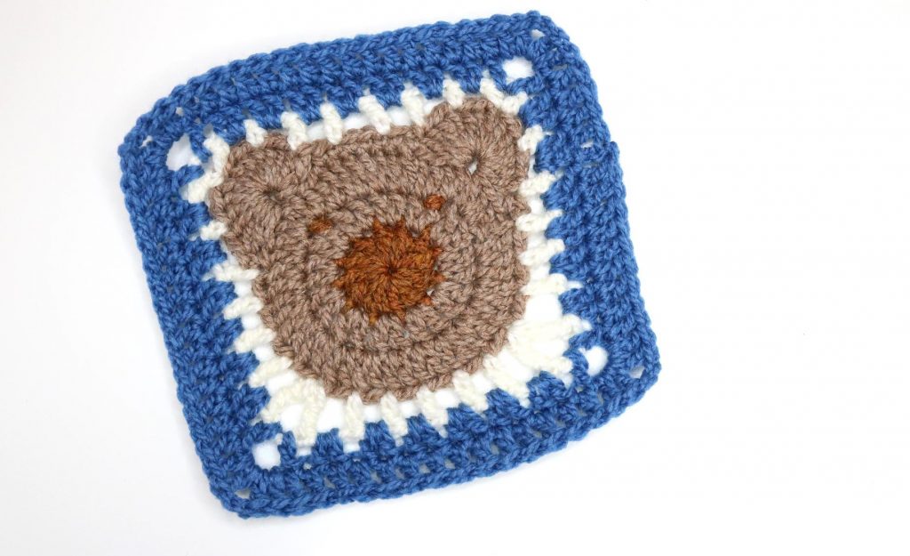 A bear-themed crochet granny square