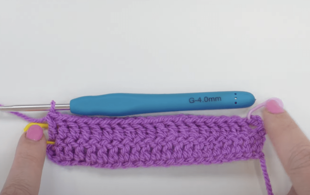 Treble crochet with stitch markers left in the end of each row.